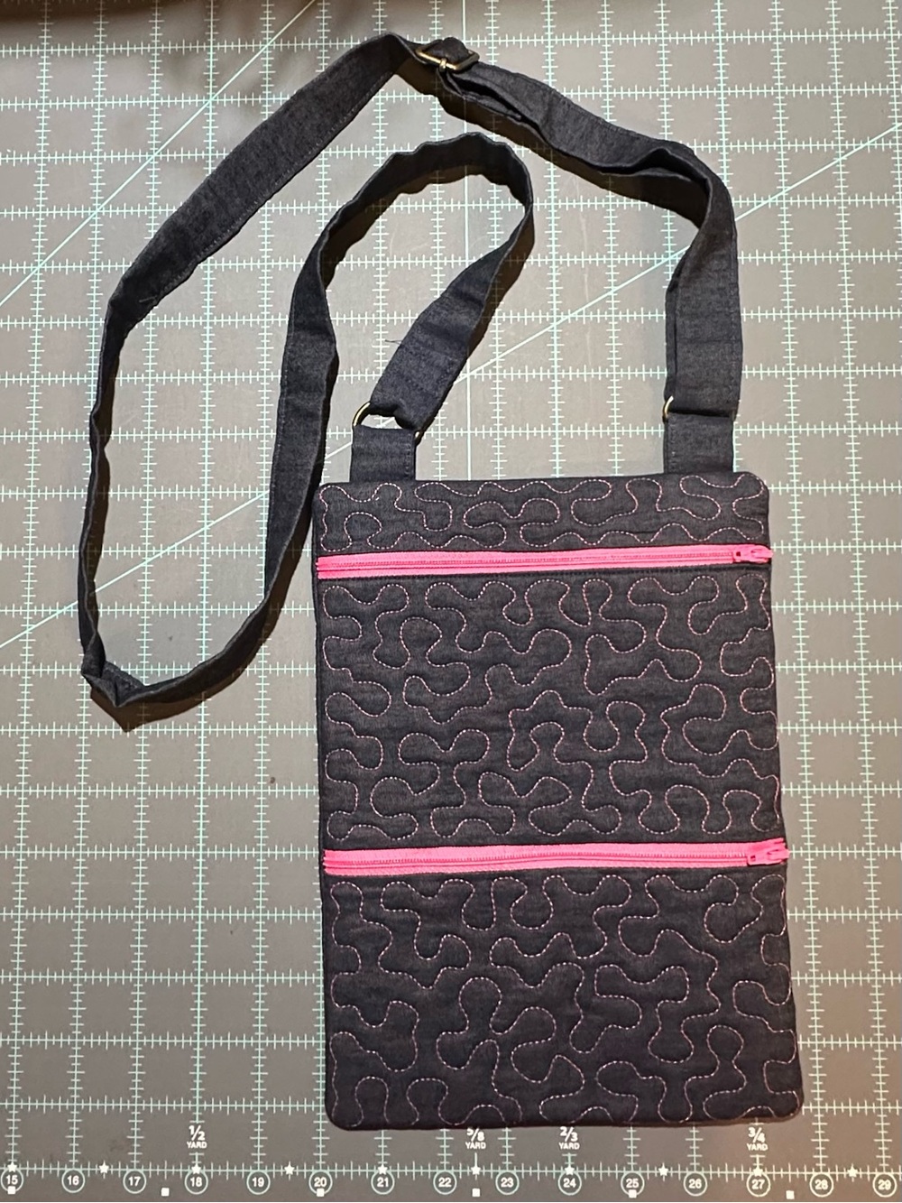 Women’s Dark Denim Crossbody Bag with Pink Accents